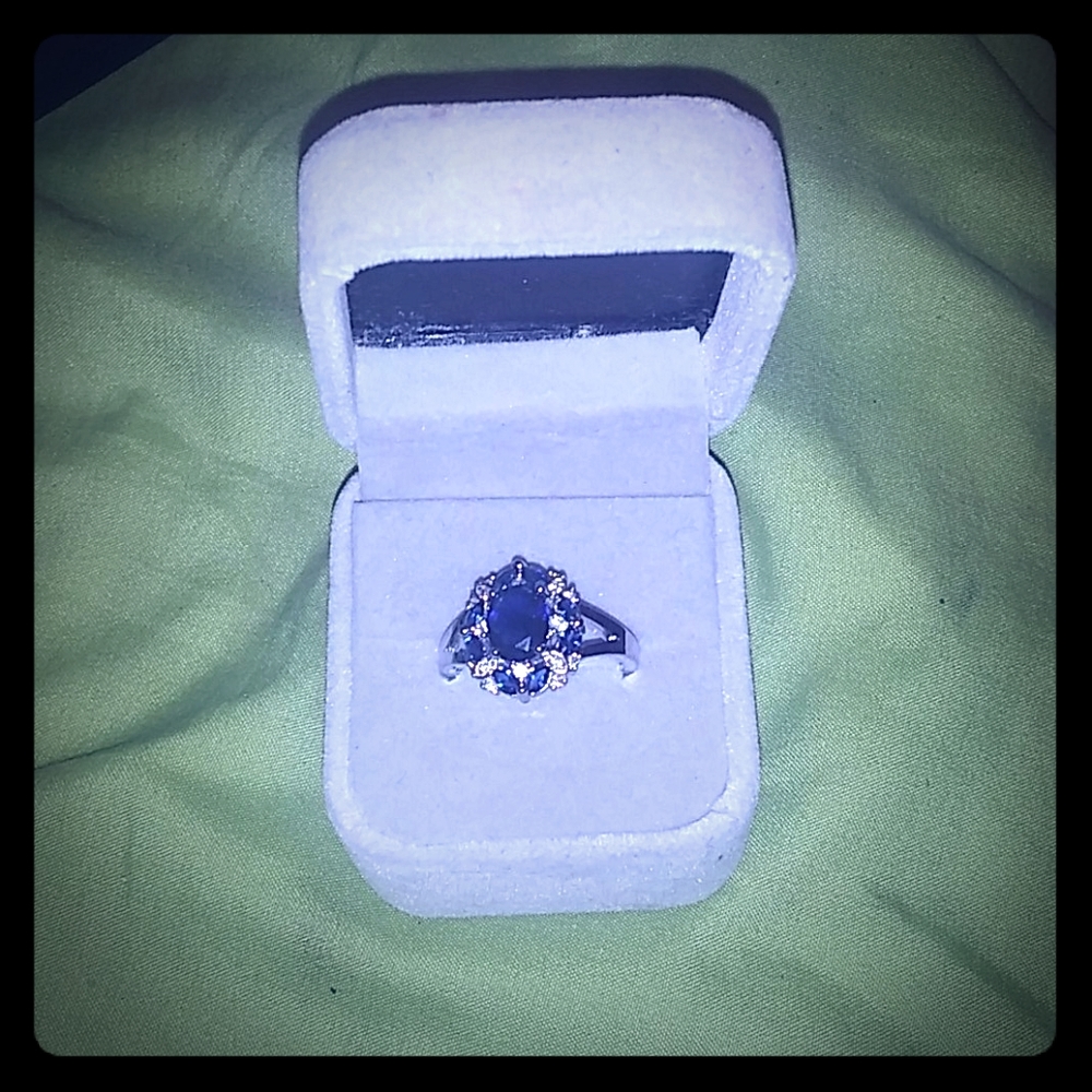 Silver ring with blue jewels